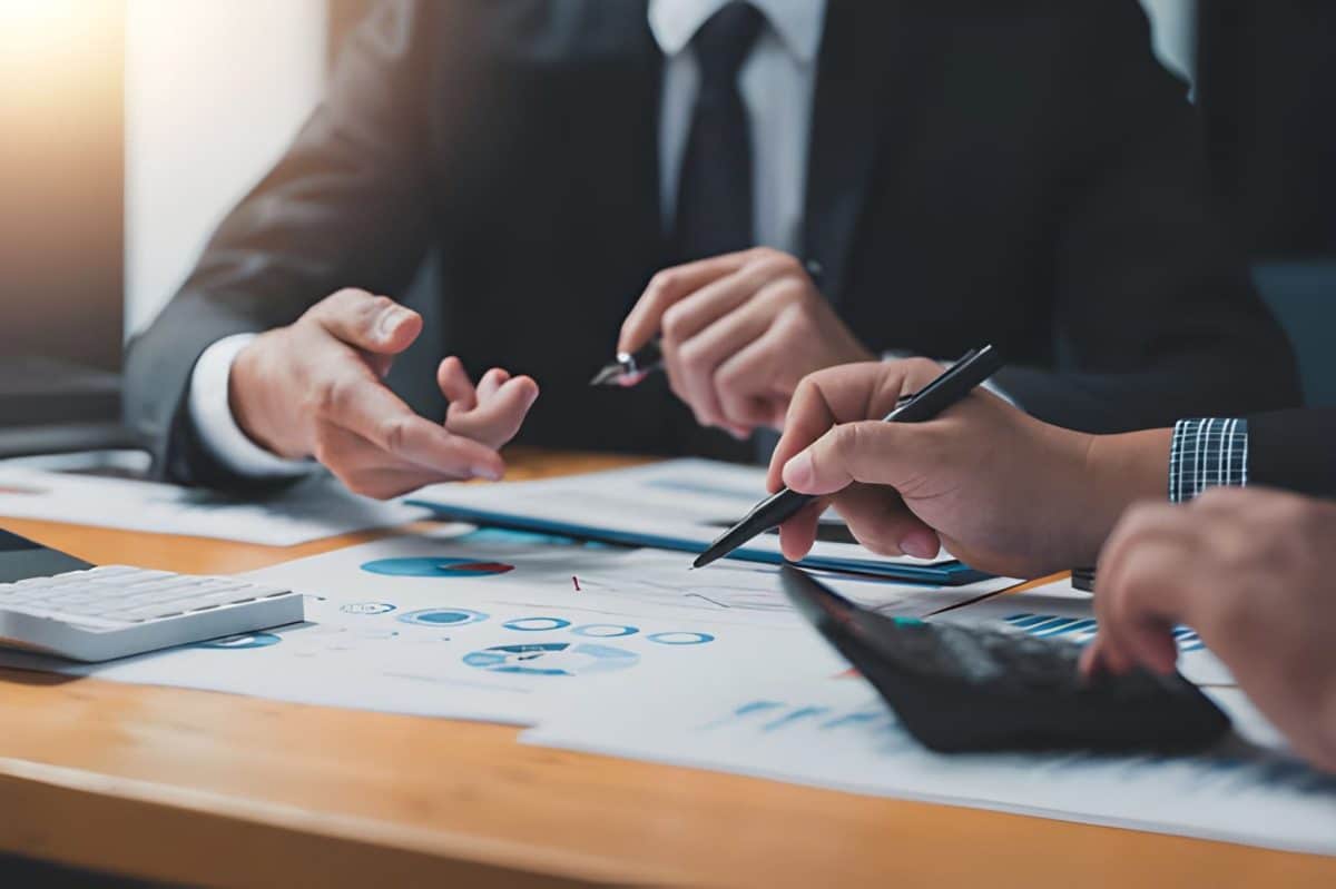Business people doing calculations analyze