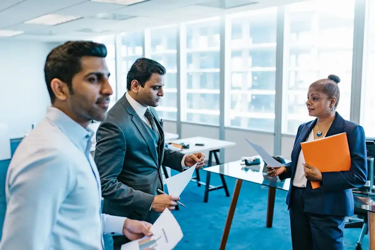 Business executives in a meeting discussing strategy and AI implementation plans